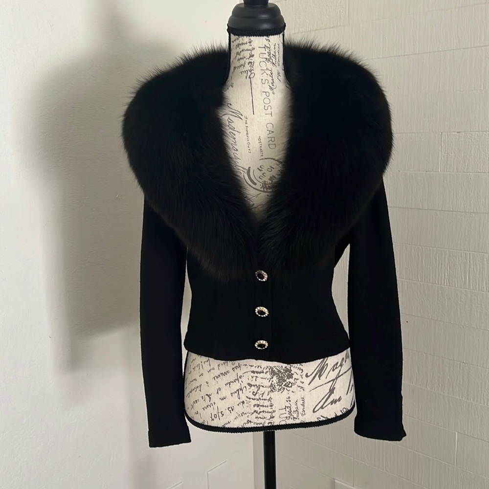 Beautiful fur St. John long sleeve knit black top.